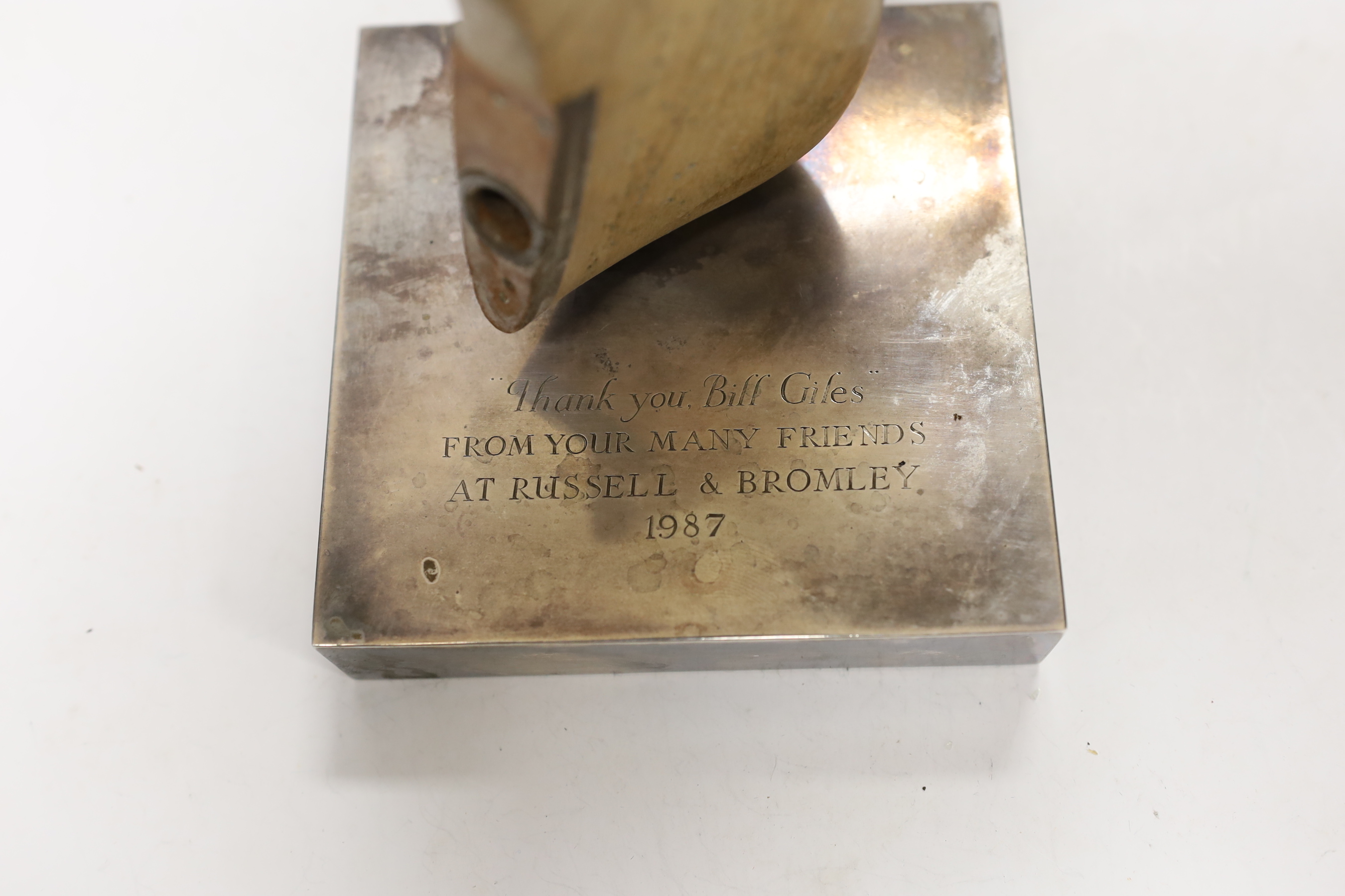 A silver mounted presentation shoe last 'Thank you Bill Giles from your many friends at Russell and Bromley 1987', 27cm